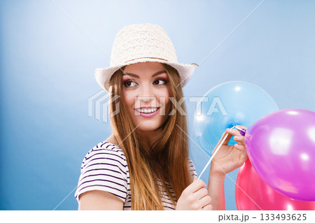 Woman summer joyful girl with colorful balloons Woman summer joyful girl with colorful balloons 133493625