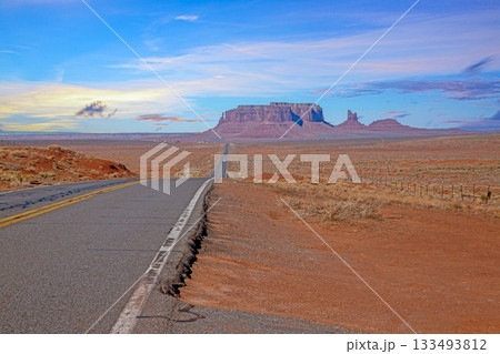 Highway leading to Monument Valley buttes Highway leading to Monument Valley buttes 133493812