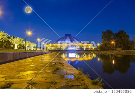 View over the Moscow State Circus  on Vernadskogo Prospekt, at night with the super moon, Russia 133495086