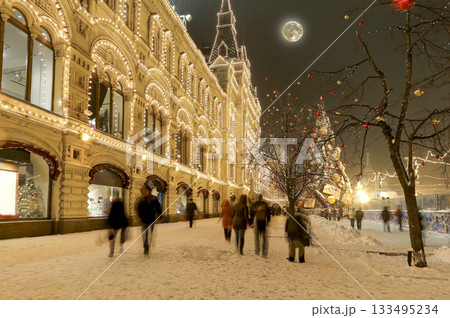 Christmas (New Year holidays) illumination Main Universal Store (GUM), Red Square in Moscow, Russia (at night with the super moon) 133495234