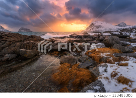 Rocky winter coast at sunset, Lofoten Islands, Norway Rocky winter coast at sunset, Lofoten Islands, Norway 133495300
