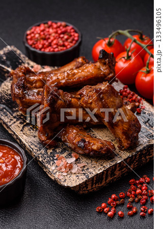 Grilled beef or pork ribs, meat cooked on a barbecue with salt and pepper. Grilled ribs 133496105