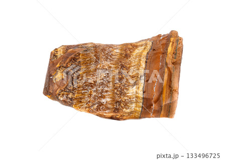 Raw Tiger's Eye Stone on Isolated Background Raw Tiger's Eye Stone on Isolated Background 133496725