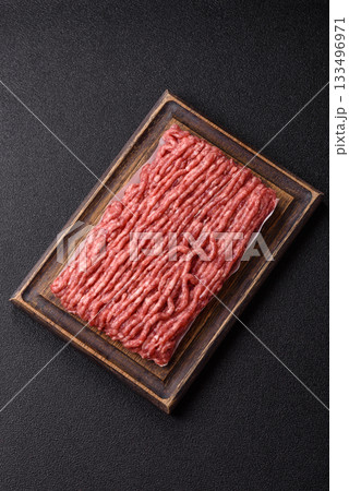Raw ground beef or pork, fresh meat for burgers or other dishes. Raw beef minced meat 133496971