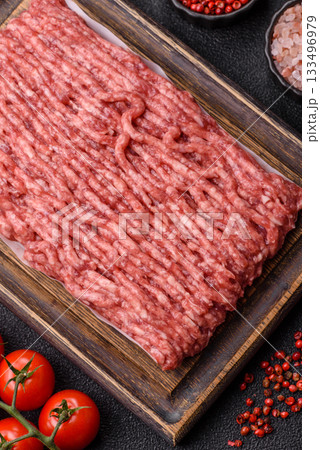 Raw ground beef or pork, fresh meat for burgers or other dishes. Raw beef minced meat Raw ground beef or pork, fresh meat for burgers or other dishes. Raw beef minced meat 133496979