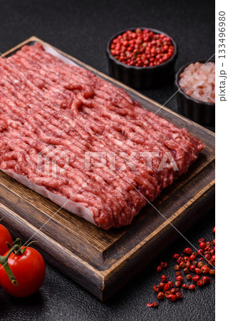 Raw ground beef or pork, fresh meat for burgers or other dishes. Raw beef minced meat Raw ground beef or pork, fresh meat for burgers or other dishes. Raw beef minced meat 133496980