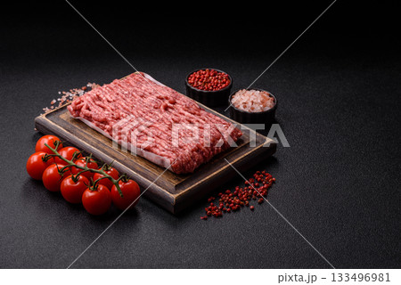 Raw ground beef or pork, fresh meat for burgers or other dishes. Raw beef minced meat Raw ground beef or pork, fresh meat for burgers or other dishes. Raw beef minced meat 133496981