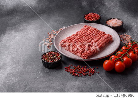 Raw ground beef or pork, fresh meat for burgers or other dishes. Raw beef minced meat Raw ground beef or pork, fresh meat for burgers or other dishes. Raw beef minced meat 133496986