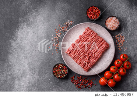 Raw ground beef or pork, fresh meat for burgers or other dishes. Raw beef minced meat Raw ground beef or pork, fresh meat for burgers or other dishes. Raw beef minced meat 133496987