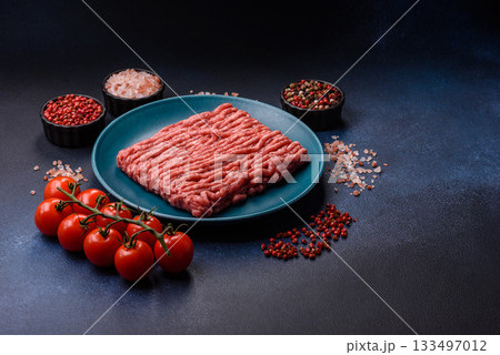 Raw ground beef or pork, fresh meat for burgers or other dishes. Raw beef minced meat 133497012