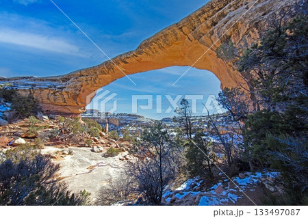 Natural Sandstone Arch in Winter at Utah Canyon 133497087