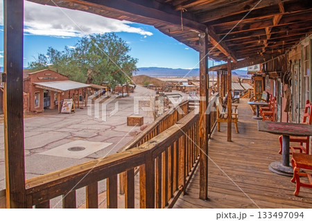 Old western ghost town scene in desert landscape Old western ghost town scene in desert landscape 133497094