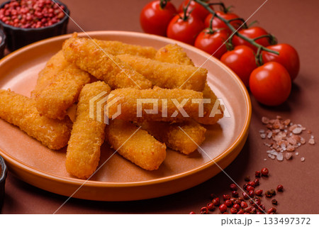 Mozzarella cheese sticks, crispy nutritious fast food. Cheese sticks as food background 133497372