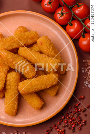 Mozzarella cheese sticks, crispy nutritious fast food. Cheese sticks as food background 133497374