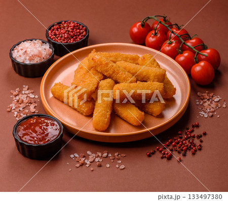 Mozzarella cheese sticks, crispy nutritious fast food. Cheese sticks as food background 133497380