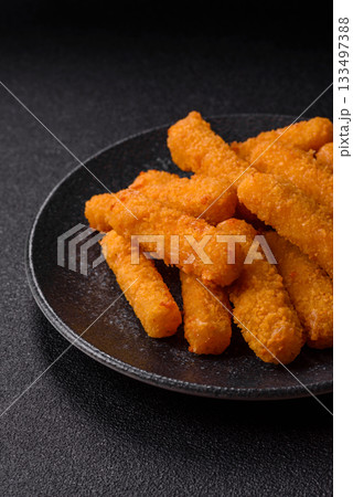 Mozzarella cheese sticks, crispy nutritious fast food. Cheese sticks as food background 133497388