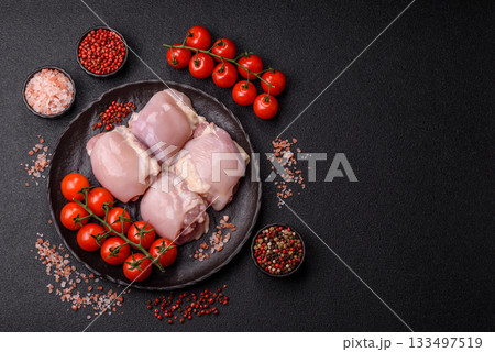Chicken or turkey raw thigh fillet, skinless and boneless poultry meat. Chicken thigh fillet Chicken or turkey raw thigh fillet, skinless and boneless poultry meat. Chicken thigh fillet 133497519