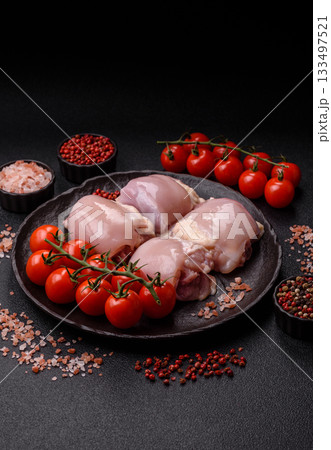 Chicken or turkey raw thigh fillet, skinless and boneless poultry meat. Chicken thigh fillet Chicken or turkey raw thigh fillet, skinless and boneless poultry meat. Chicken thigh fillet 133497521