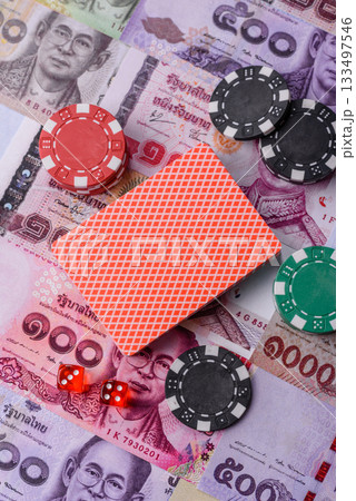 Casino and gambling in Thailand, risk to win or lose money. Betting chips as a background Casino and gambling in Thailand, risk to win or lose money. Betting chips as a background 133497546