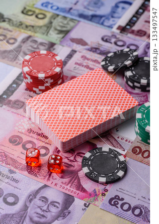 Casino and gambling in Thailand, risk to win or lose money. Betting chips as a background Casino and gambling in Thailand, risk to win or lose money. Betting chips as a background 133497547