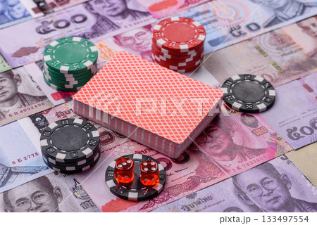 Casino and gambling in Thailand, risk to win or lose money. Betting chips as a background Casino and gambling in Thailand, risk to win or lose money. Betting chips as a background 133497554