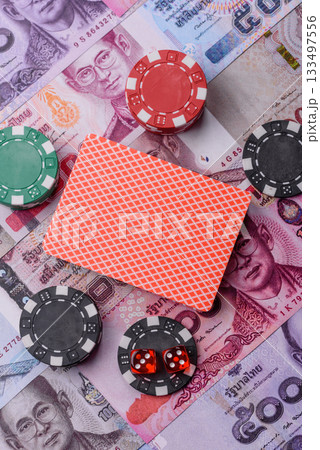 Casino and gambling in Thailand, risk to win or lose money. Betting chips as a background 133497556