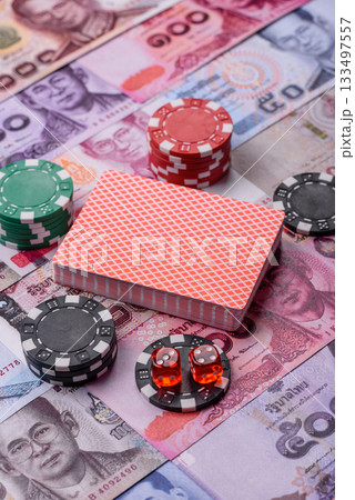 Casino and gambling in Thailand, risk to win or lose money. Betting chips as a background Casino and gambling in Thailand, risk to win or lose money. Betting chips as a background 133497557