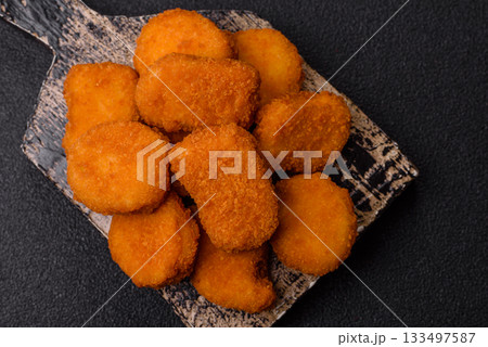 Chicken nugget with sauce, crispy nutritious fast food. Chicken nugget Chicken nugget with sauce, crispy nutritious fast food. Chicken nugget 133497587