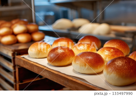Freshly baked bread rolls on display in a bakery 133497990