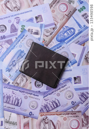 UAE money, dirhams, cash arabic banknotes for financial and business processes. Emirates cash 133498598