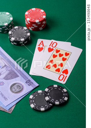 Casino game in the United Arab Emirates, dirham, chips, cards. Gambling in casinos in the Emirates 133498648