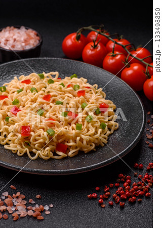Asian food, chinese or thai rice noodles with vegetables and meat. Rice noodles Asian food, chinese or thai rice noodles with vegetables and meat. Rice noodles 133498850