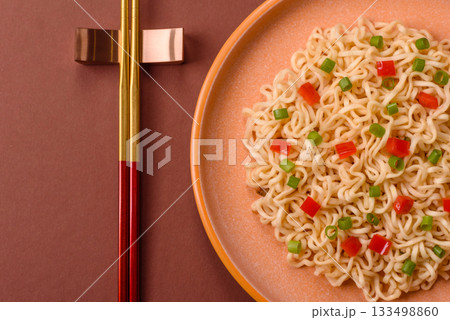 Asian food, chinese or thai rice noodles with vegetables and meat. Rice noodles Asian food, chinese or thai rice noodles with vegetables and meat. Rice noodles 133498860