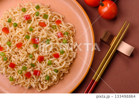 Asian food, chinese or thai rice noodles with vegetables and meat. Rice noodles Asian food, chinese or thai rice noodles with vegetables and meat. Rice noodles 133498864