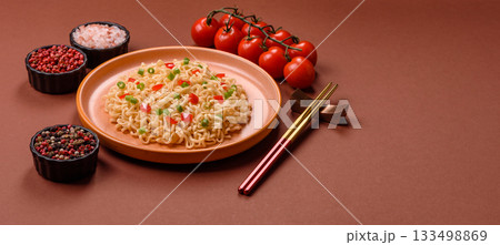 Asian food, chinese or thai rice noodles with vegetables and meat. Rice noodles Asian food, chinese or thai rice noodles with vegetables and meat. Rice noodles 133498869