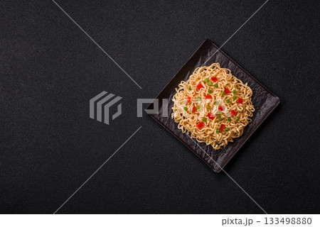 Asian food, chinese or thai rice noodles with vegetables and meat. Rice noodles 133498880