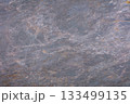 Captivating texture of natural stone with subtle hues and patterns from nature's artistry 133499135