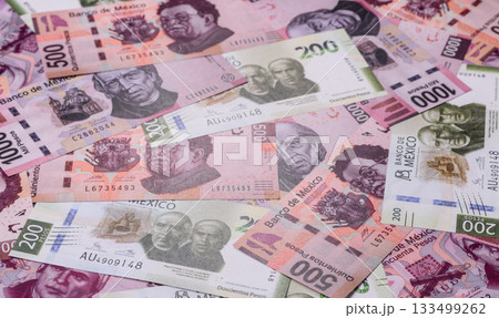 Mexican paper money, pesos in various denominations. Mexican money 133499262