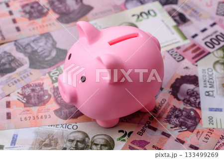 Mexican paper money, pesos in various denominations. Mexican money 133499269