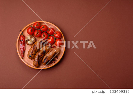 Grilled chicken or beef sausages with sauce and spices. Grilled sausages Grilled chicken or beef sausages with sauce and spices. Grilled sausages 133499353