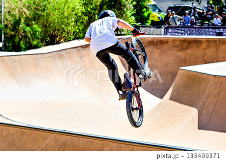 motorcyclist on a bike rider 133499371