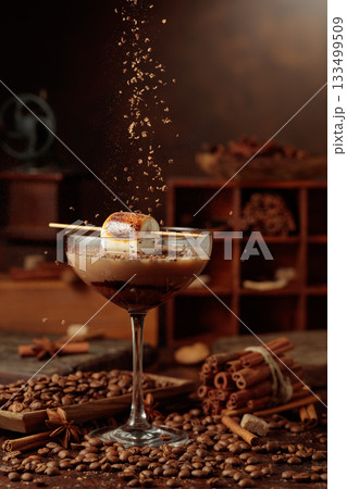 Cream and coffee cocktail with toasted marshmallow and chocolate crumbs. Cream and coffee cocktail with toasted marshmallow and chocolate crumbs. 133499509