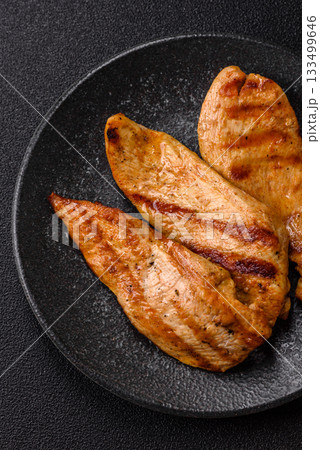 Grilled chicken or turkey breast, a healthy lunch option. Grilled chicken steak 133499646