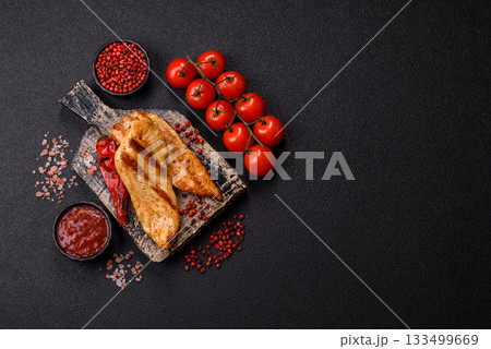 Grilled chicken or turkey breast, a healthy lunch option. Grilled chicken steak Grilled chicken or turkey breast, a healthy lunch option. Grilled chicken steak 133499669