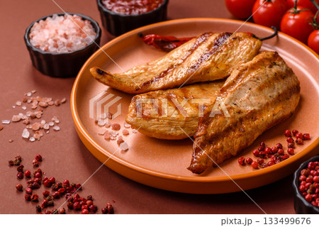 Grilled chicken or turkey breast, a healthy lunch option. Grilled chicken steak Grilled chicken or turkey breast, a healthy lunch option. Grilled chicken steak 133499676