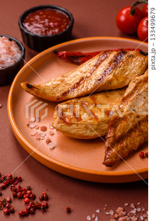 Grilled chicken or turkey breast, a healthy lunch option. Grilled chicken steak Grilled chicken or turkey breast, a healthy lunch option. Grilled chicken steak 133499679