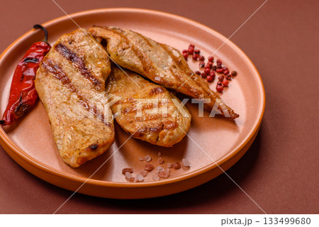 Grilled chicken or turkey breast, a healthy lunch option. Grilled chicken steak 133499680
