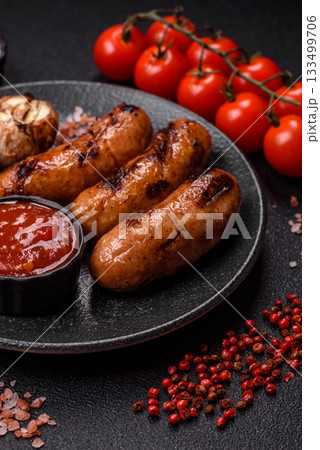 Grilled chicken or beef sausages with sauce and spices. Grilled sausages Grilled chicken or beef sausages with sauce and spices. Grilled sausages 133499706