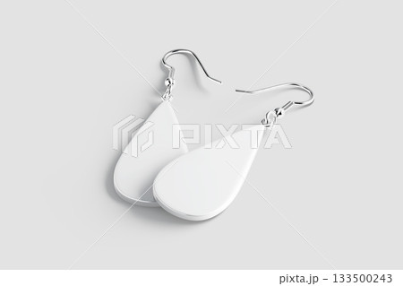 Blank white drop earring pair mockup lying, grey background Blank white drop earring pair mockup lying, grey background 133500243
