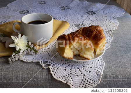 a special breakfast set for Valentine's Day, decorated in a romantic style, with candles and flowers. Side view horizontal picture a special breakfast set for Valentine's Day, decorated in a romantic style, with candles and flowers. Side view horizontal picture 133500892
